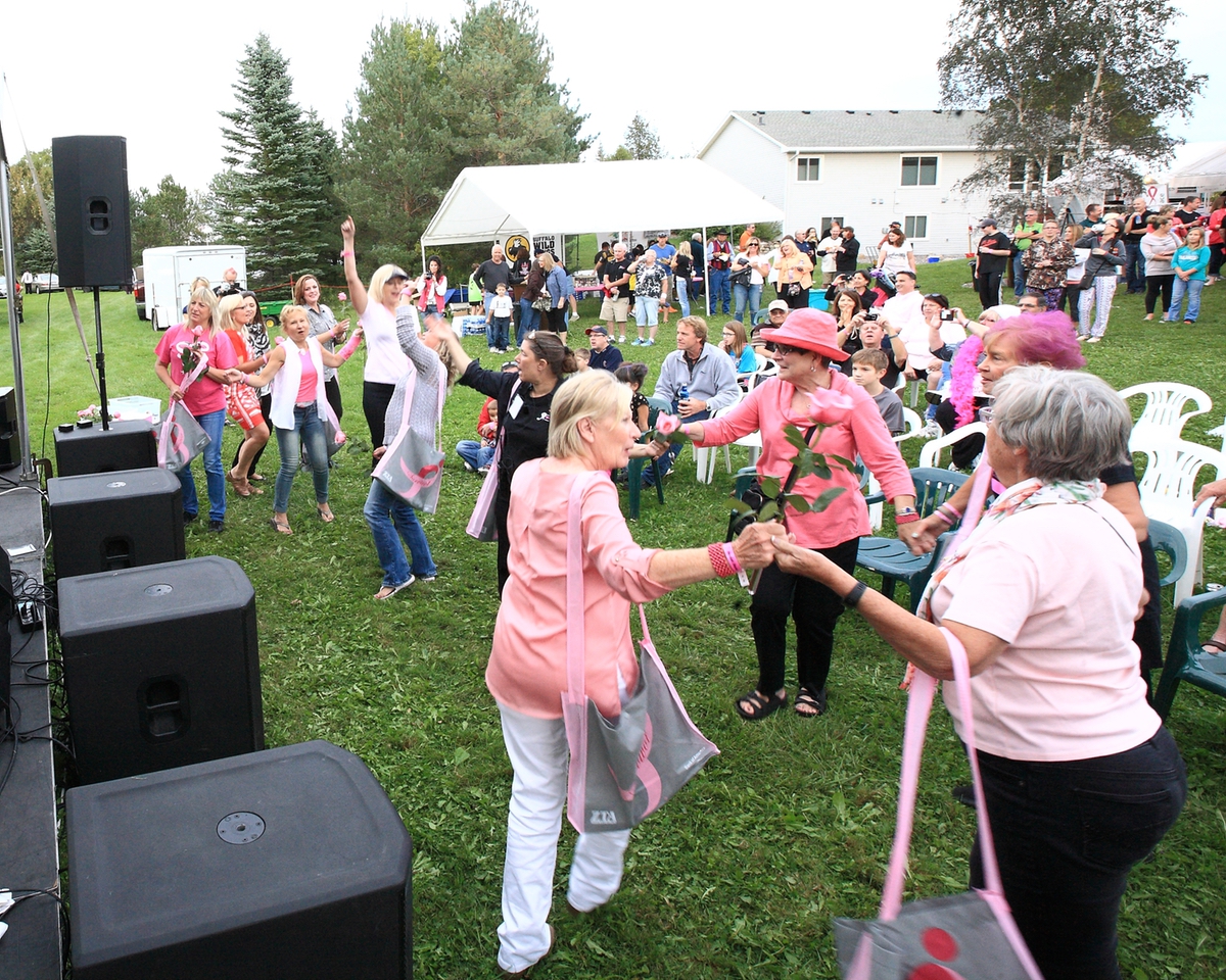 cancer survivors dancing together