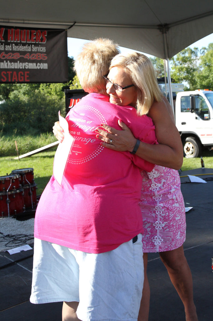 Judy and survivor Punky embracing on stage